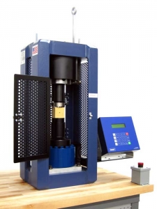 Hydraulic Testing Machine equipped with ADMET's MegaForce testing a cement cube