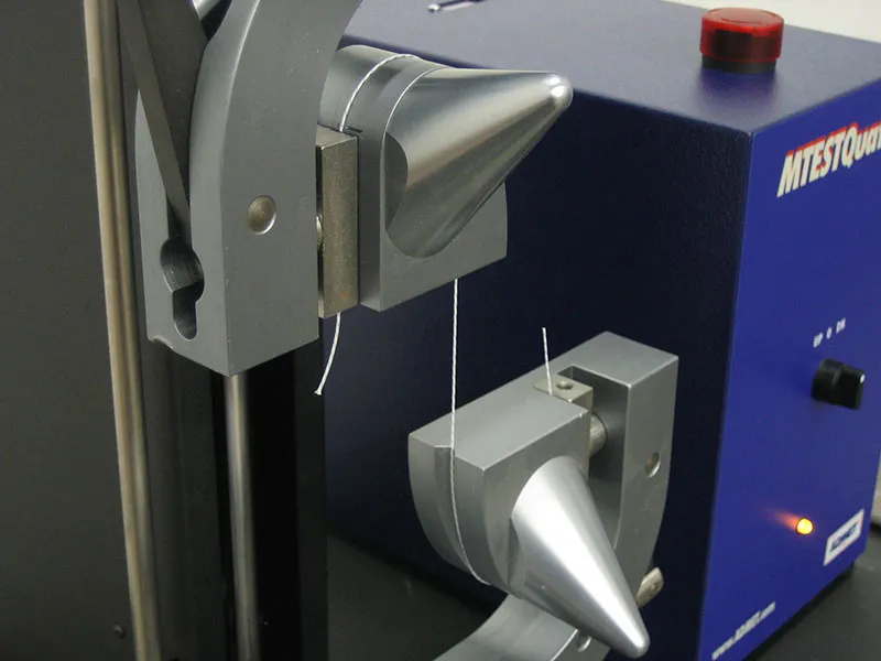 Thread tension testing grips