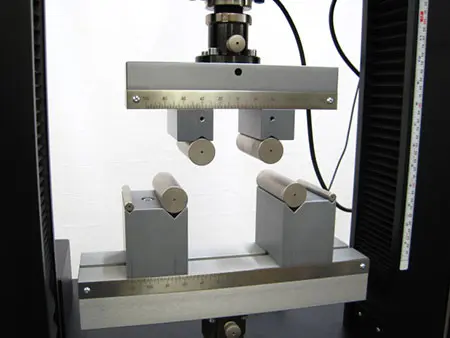 Bend fixture on an eXpert 2600 for ASTM C203 testing