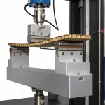 ASTM D7249 3 point bend test of corrugated material with deflectometer