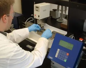 scientist preparing a specimen for in vitro testing