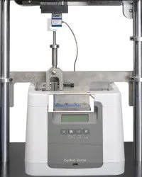 Custom test system performing test on medical adhesive sample